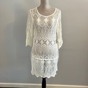 Grass collection size medium cover up in lace and embroidered. Cream color.